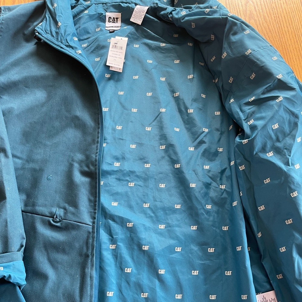 CAT ( Caterpillar ) Women’s winter hooded coat. Teal color, thumb hole as seen - Picture 10 of 12